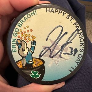 Signed Logan couture puck